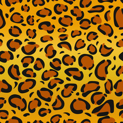 Fototapeta na wymiar Leopard or Jaguar seamless pattern. Cheetah fur texture. Design for backgrounds, fabric, wallpaper, textile. Vector illustration of animal print. 