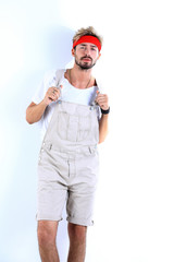 Full length of a young athlete on a white background