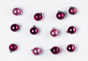 Christmas flat lay top view scene with pink and violet glass balls