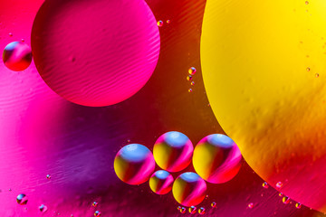 Abstract background with colorful gradient colors. Oil drops in water abstract psychedelic pattern...