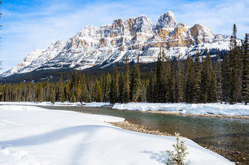 Castle Mountain and Bow River Covered in Snow on a Clear Winter Day. Banff National Park, AB, canada