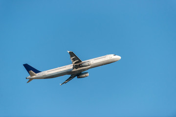 Passenger Airliner flying in the sky