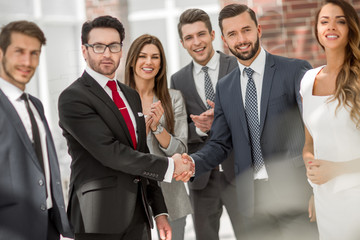 business shaking hands with business partner