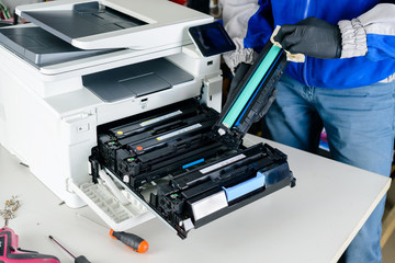 master professional refills laser printer cartridges in the workshop