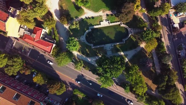 day time milan city living block rooftops traffic street aerial down view 4k italy