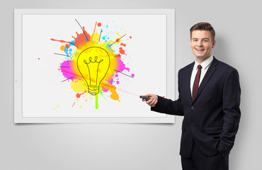 Fototapeta premium Man with laser pointer presenting innovative idea 