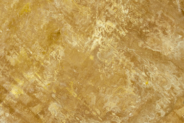 Abstract grunge surface orange bronze gold background golden yellow highlights