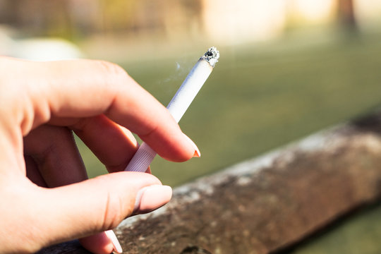 Cigarette in the woman hand 