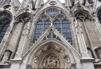 Fototapeta na wymiar Sculptures at the main entrance to the cathedral Notre Dame de Paris. Notre Dame - famous Gothic, Roman Catholic cathedral on eastern half of Cite Island, Paris, France.