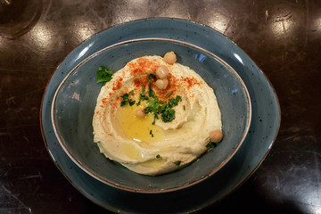 Hummus on a plate with chick peas