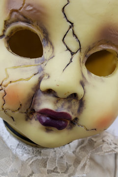 Scary cracked old doll face for halloween