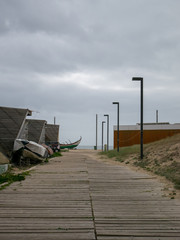 Path leading to the beach during cloudy day