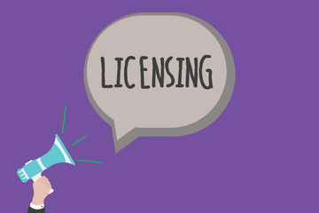 Handwriting text Licensing. Concept meaning authorize the use perforanalysisce or release of something like car.