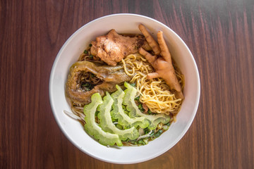 Chicken Noodle Placed on Wooden Table