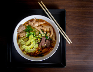 Chicken Noodle Placed on Wooden Table