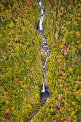 An aerial view of a remote waterfall in the Adirondack mountains