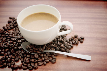 Hot coffee with coffee beans