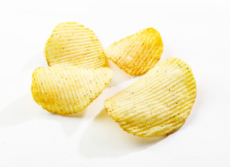 Potato chips isolated white background close up
