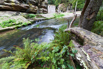 Fototapeta premium Dolsky watermill on Kamenice river, Jetrichovice region, Czech Switzerland, Czech republic