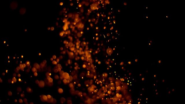 Fire sparks in super slow motion isolated on black, shooting with high speed cinema camera at 4K