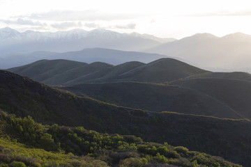 Naklejka premium Hills sunshine sunset mountains