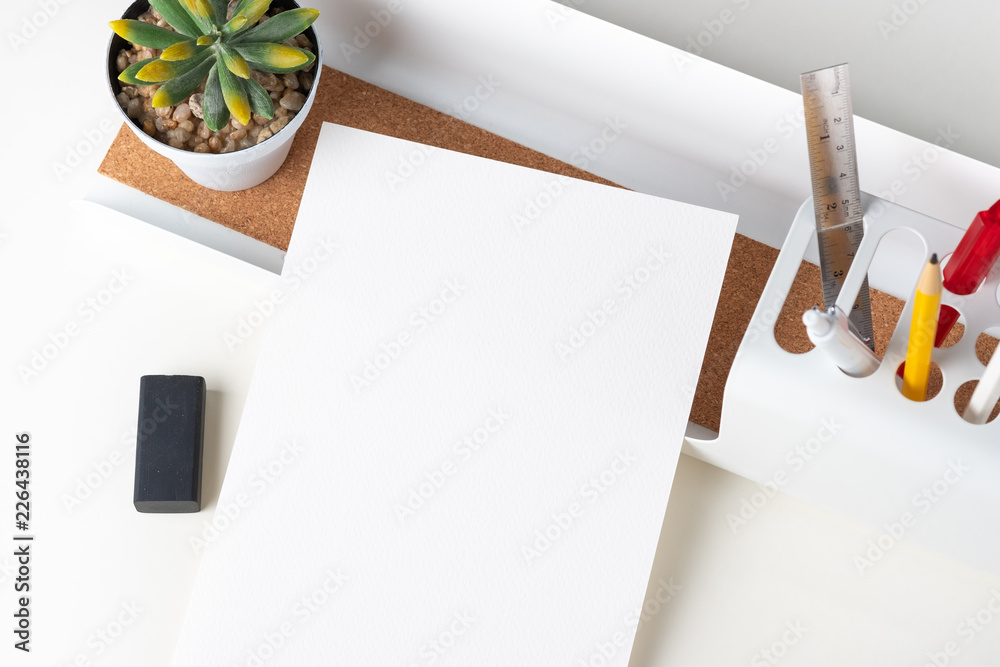 Poster top view white paper note on modern office stationery on white table.pencil, notepad,ruler,pen and p