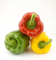 Fresh capsicum or bell pepper on white background