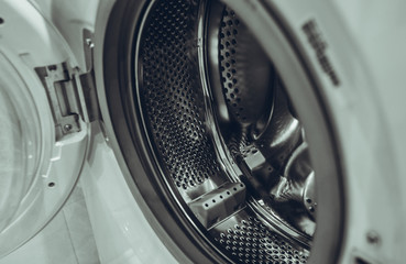 drum washing machine in black and white