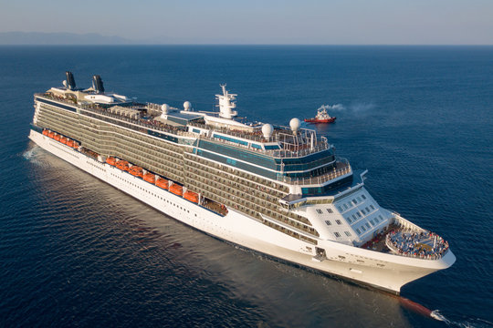 Large cruise ship at sea - Aerial image at sunrise.