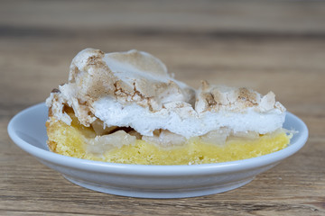 Apple cream cake from short pastry with custard. Piece of apple pie