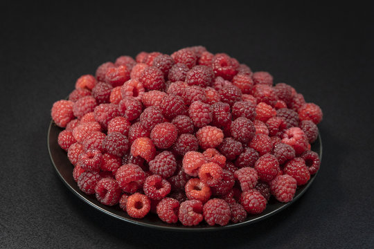 Fresh, ripe, juicy red raspberry background, close up berry, macro