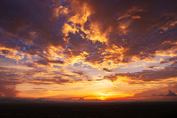 Fototapeta na wymiar Beautiful evening sunset on the sky with clouds
