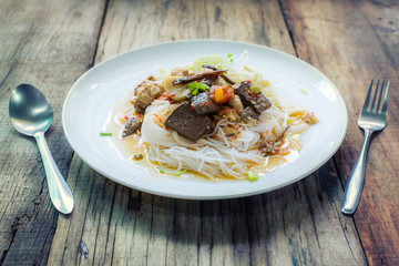 Thai noodles topped with curry