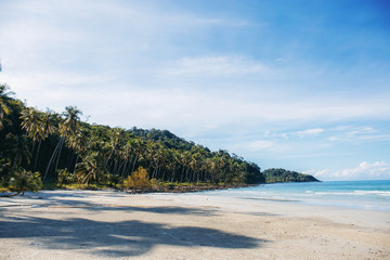 Beach with shadow and sky.