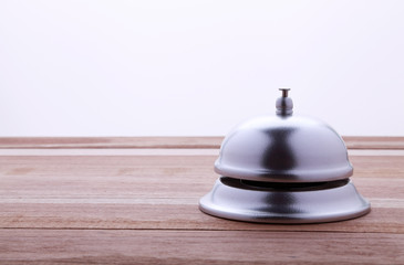 Service bell on a wooden surface