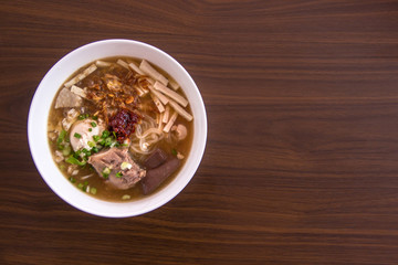 Chicken Noodle Placed on Wooden Table