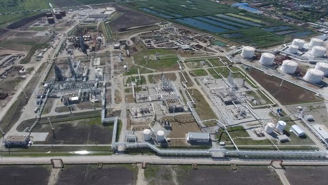 Oil refinery plant for primary and deep oil refining. Equipment and tanks in the oil refinery. Rectification and vacuum equipment