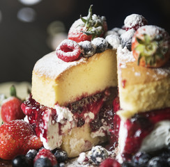 Closeup of a layered cake with a slice cut out