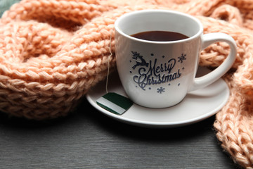 Cup of tea and winter scarf