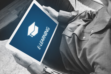 Online education, e-learning and e-book concept. a man using digital tablet for education © SasinParaksa
