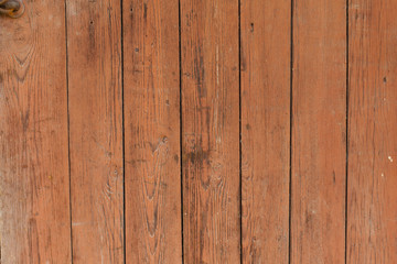 Fototapeta na wymiar background old wooden wall of red boards