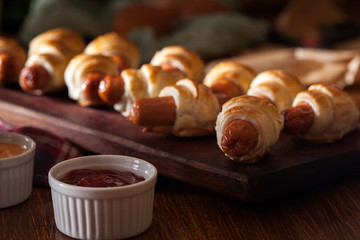 Pigs in blankets. Dark mood