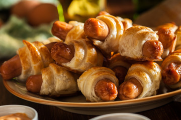 Pigs in blankets. Dark mood