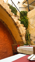 Fototapeta na wymiar Stairwell at a crete restaurant