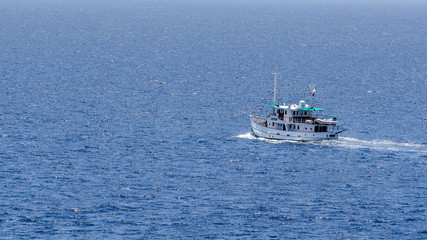 fishing boat alone in the sea