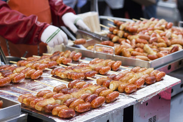 Street food, sausages on stick, Seoul, South Korea