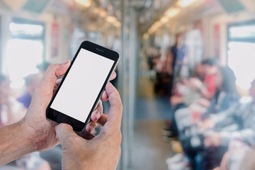 Man hands using smart phone with blurred electric train  background. Blank screen for graphics display montage.