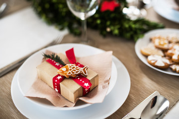 A table set for a dinner at home at Christmas time.