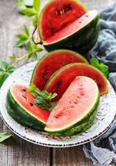 Watermelon with green leaves