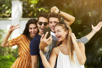 Couples posing together for Smartphone selfie
